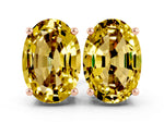 Oval Cut Yellow Sapphire Stud Earrings in Rose gold with Basket Setting