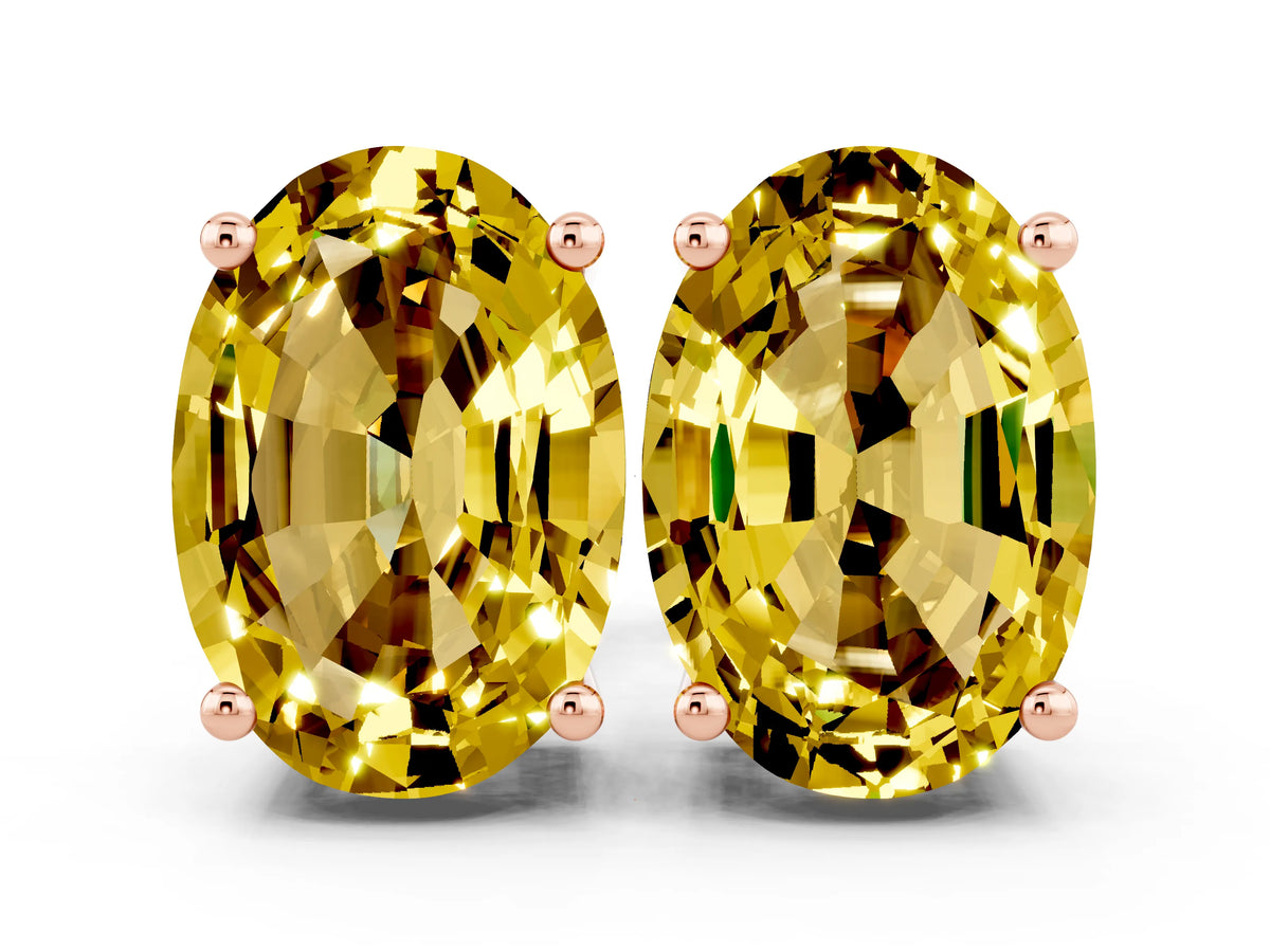 Oval Cut Yellow Sapphire Stud Earrings in Rose gold with Basket Setting