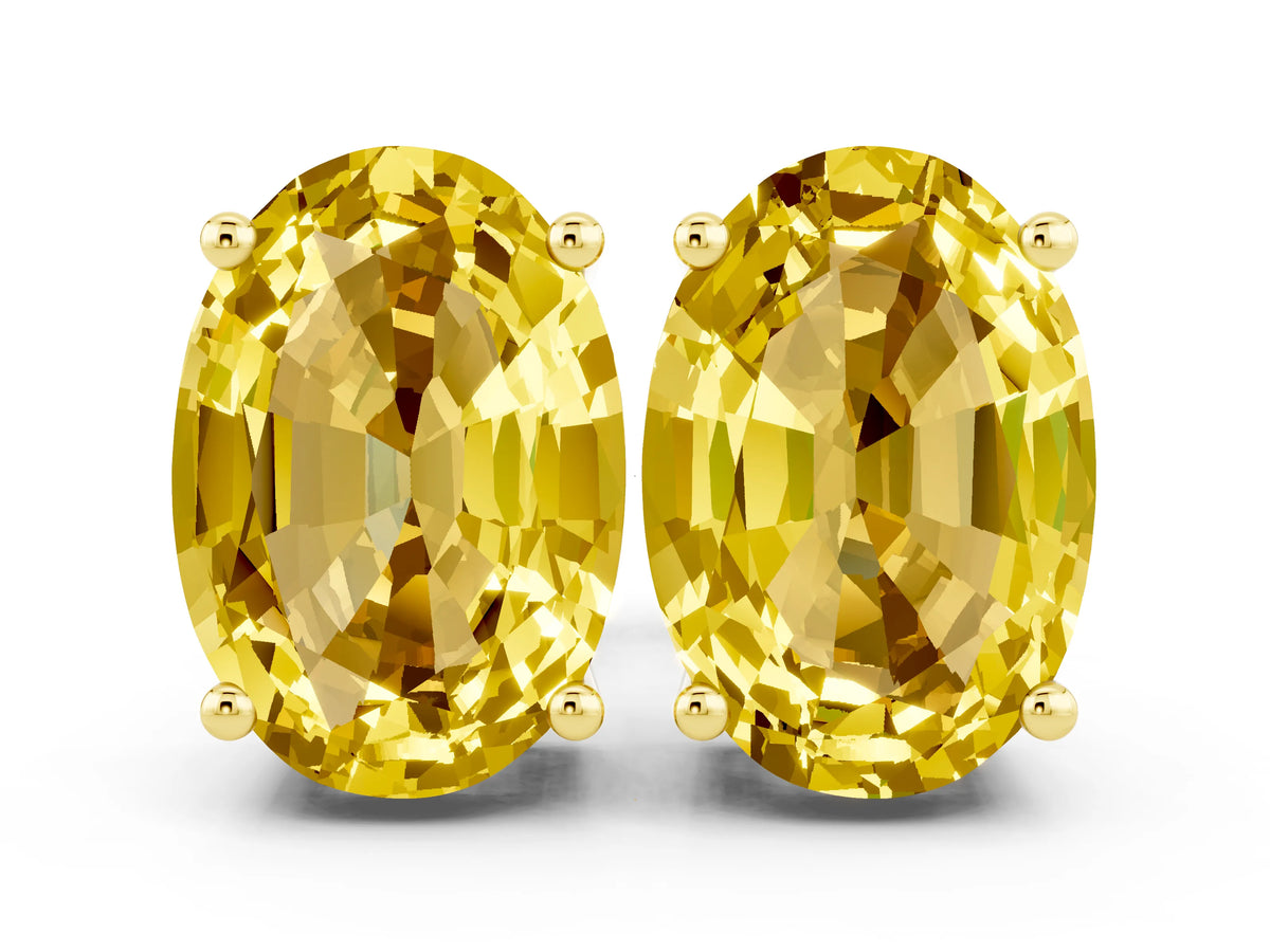 Oval Cut Yellow Sapphire Stud Earrings in Yellow gold with Basket Setting