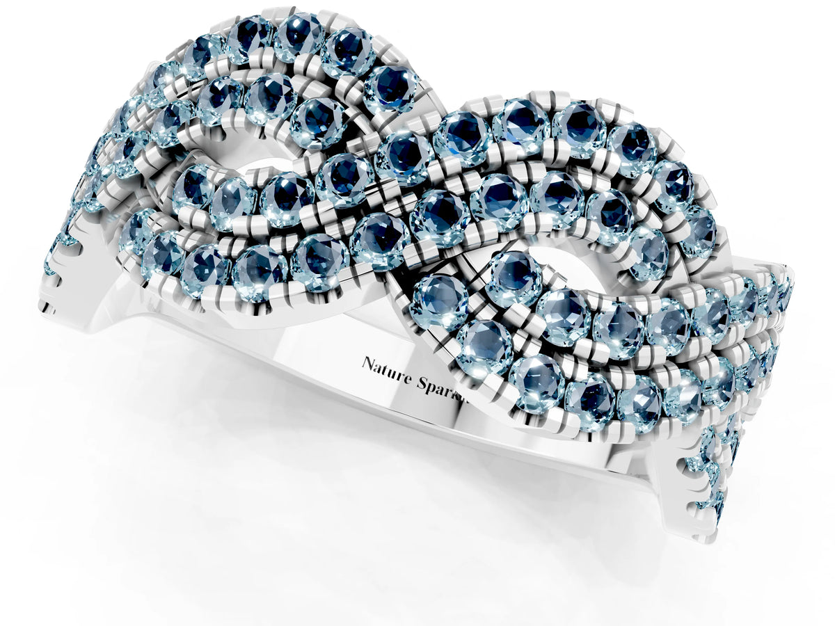Pavé Round Aquamarine Infinity Twist Band in White gold with Shared Prong Setting_1