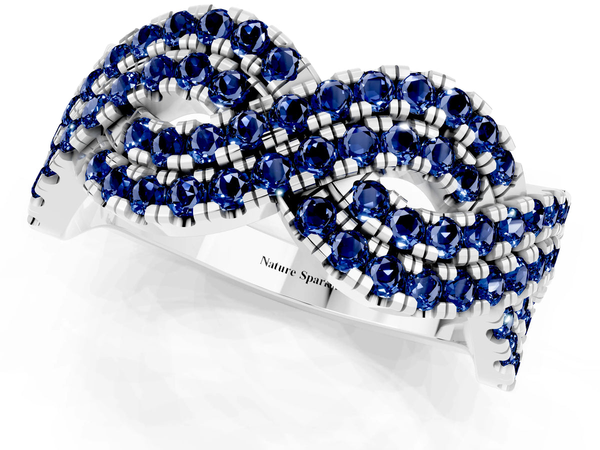 Pavé Round Blue Sapphire Infinity Twist Band in Platinum with Shared Prong Setting_1