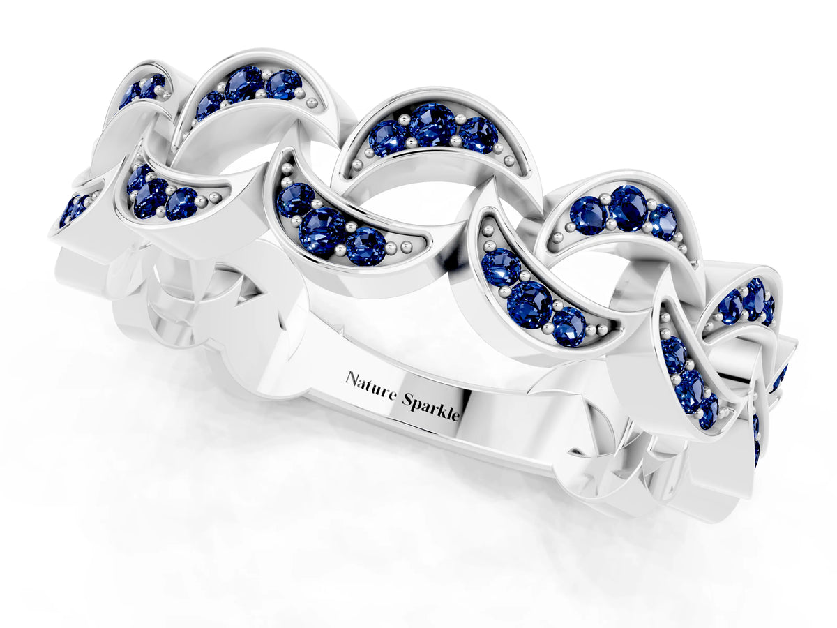Pavé Round Blue Sapphire Interlocking Eternity Band in Platinum with Bezel Prong Setting_1