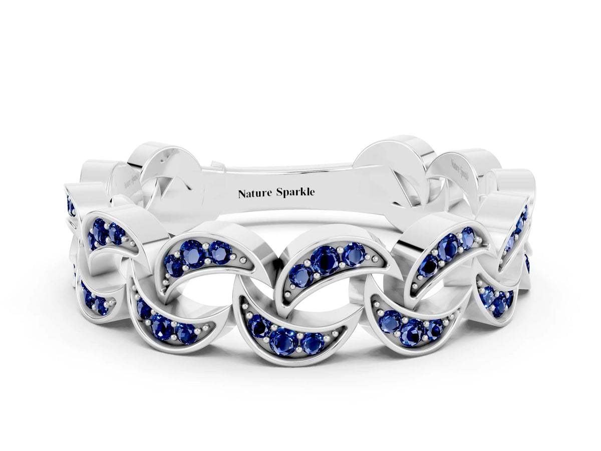 Pavé Round Blue Sapphire Interlocking Eternity Band in Silver with Bezel Prong Setting