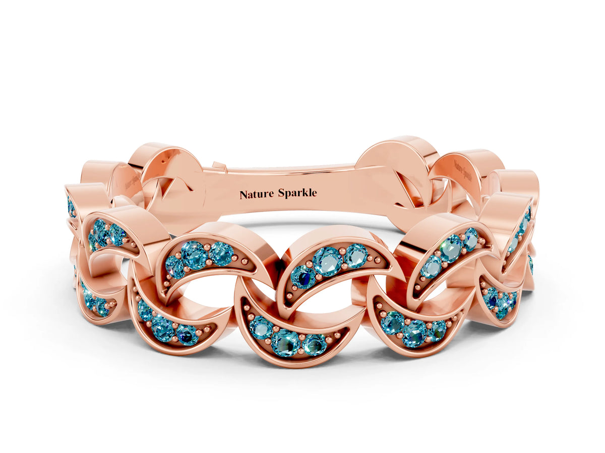 Pavé Round Blue Topaz Interlocking Eternity Band in Rose gold with Bezel Prong Setting