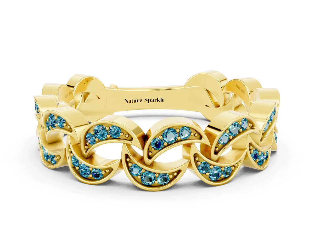 Pavé Round Blue Topaz Interlocking Eternity Band in Yellow gold with Bezel Prong Setting
