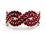 Pavé Round Garnet Infinity Twist Band in Rose gold with Shared Prong Setting