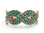 Pavé Round Green Sapphire Infinity Twist Band in Rose gold with Shared Prong Setting