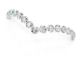 Pavé Round Moissanite Chevron Band in Rose gold with Shared Prong Setting_1