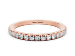 Pavé Round Moissanite Half Eternity Band in Rose gold with Shared Prong Setting