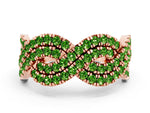 Pavé Round Peridot Infinity Twist Band in Rose gold with Shared Prong Setting