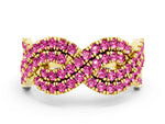 Pavé Round Pink Sapphire Infinity Twist Band in Yellow gold with Shared Prong Setting