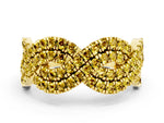 Pavé Round Yellow Sapphire Infinity Twist Band in Yellow gold with Shared Prong Setting