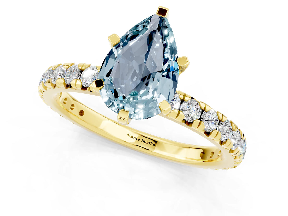 Pear Cut Aquamarine Pavé Solitaire Ring in Yellow gold with Round Pavé Band and Prong Setting_1