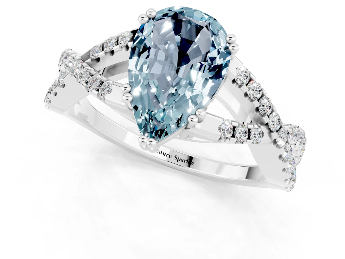 Pear Cut Aquamarine Solitaire Ring in Platinum with Interwoven Pavé Band and Prong Setting_7
