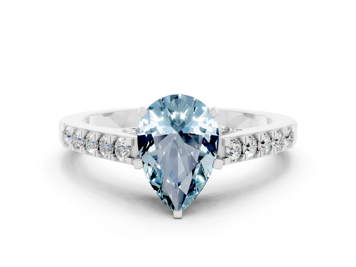 Pear Cut Aquamarine Solitaire Ring in White gold with Crossover Gallery and Round Pavé Band