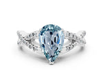 Pear Cut Aquamarine Solitaire Ring in White gold with Interwoven Pavé Band and Prong Setting
