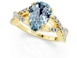 Pear Cut Aquamarine Solitaire Ring in Yellow gold with Interwoven Pavé Band and Prong Setting_1