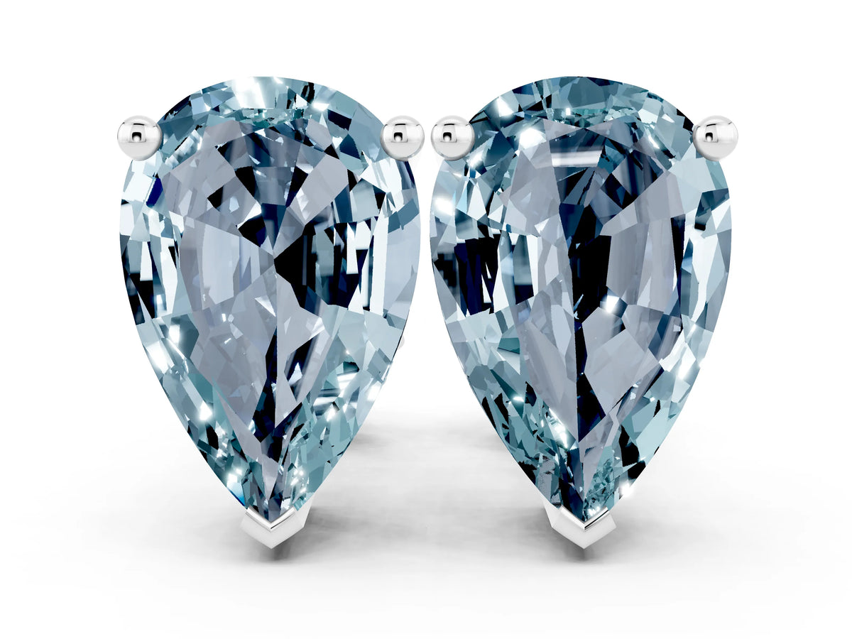 Pear Cut Aquamarine Stud Earrings in White gold with Basket Setting