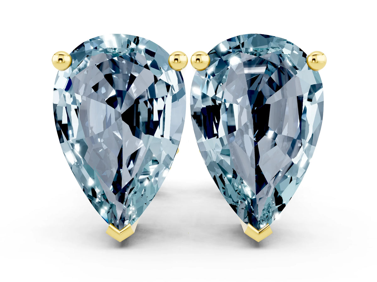 Pear Cut Aquamarine Stud Earrings in Yellow gold with Basket Setting