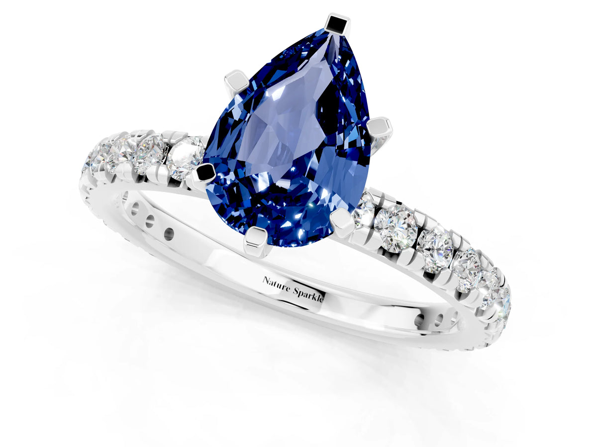 Pear Cut Blue Sapphire Pavé Solitaire Ring in White gold with Round Pavé Band and Prong Setting_1