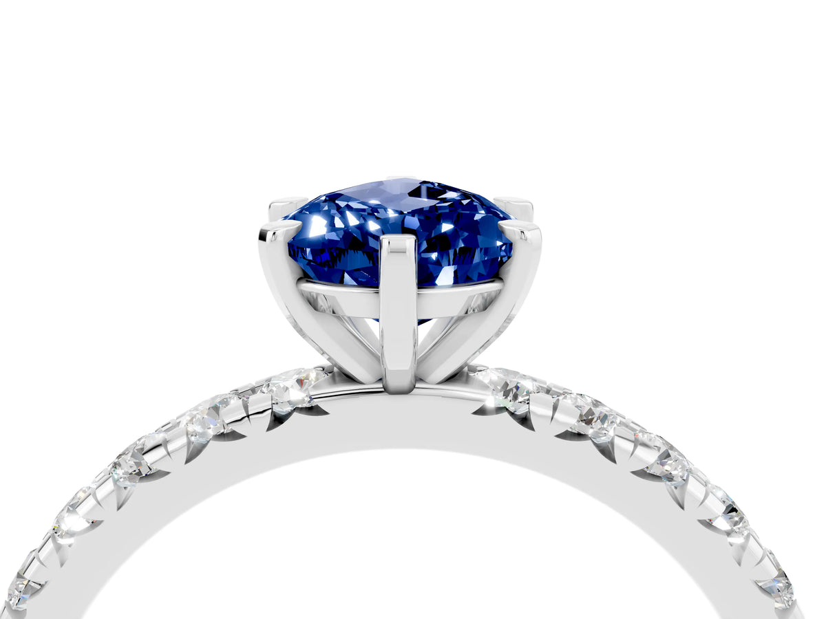 Pear Cut Blue Sapphire Pavé Solitaire Ring in White gold with Round Pavé Band and Prong Setting_4