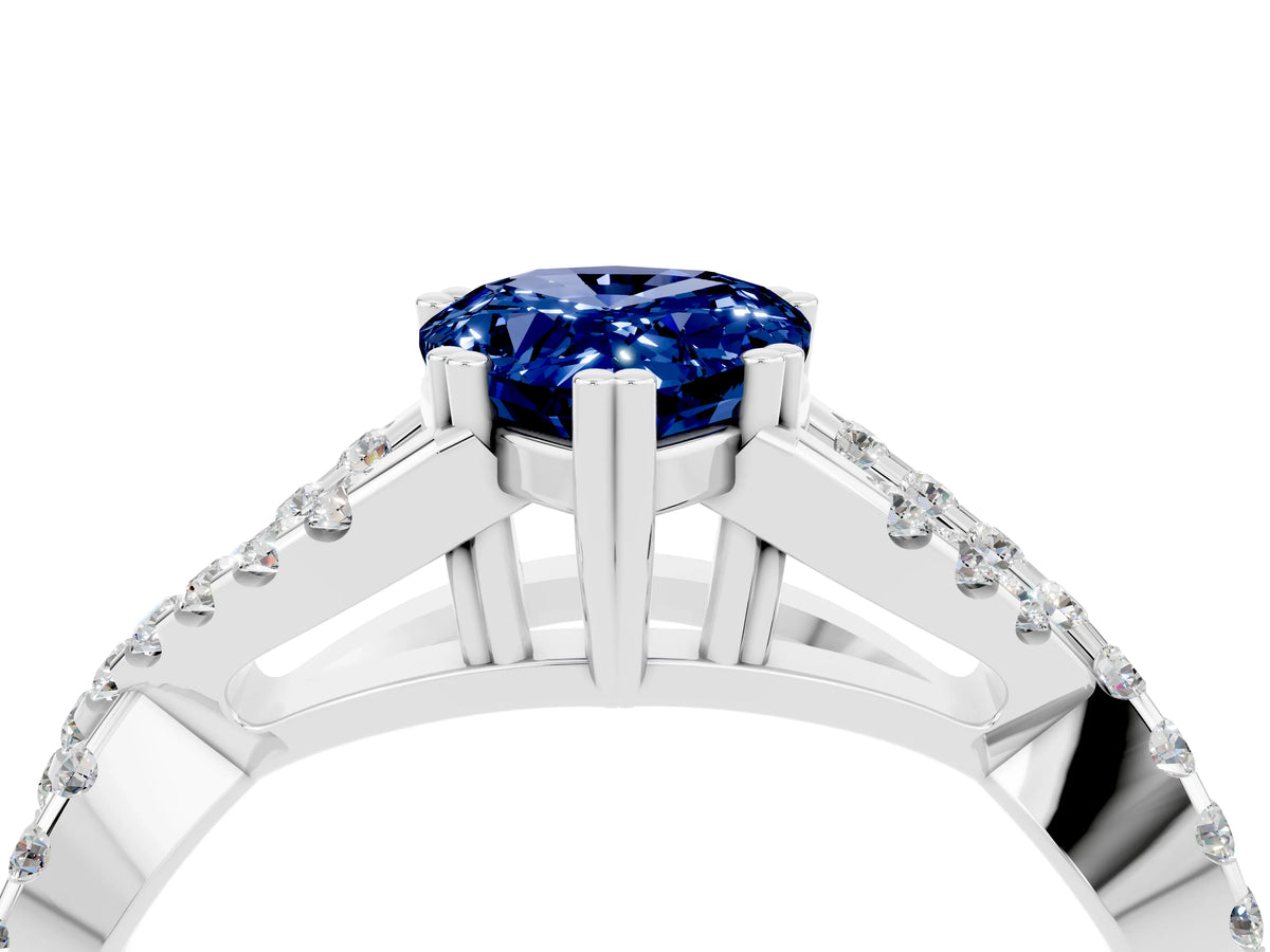 Pear Cut Blue Sapphire Solitaire Ring in Platinum with Interwoven Pavé Band and Prong Setting_10