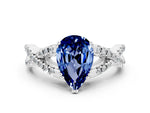 Pear Cut Blue Sapphire Solitaire Ring in Platinum with Interwoven Pavé Band and Prong Setting_6