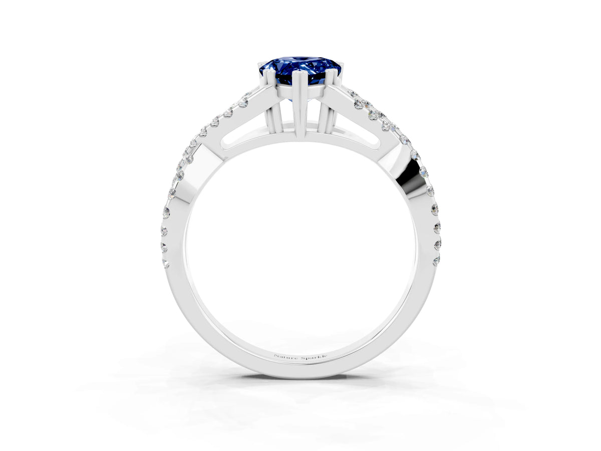 Pear Cut Blue Sapphire Solitaire Ring in Platinum with Interwoven Pavé Band and Prong Setting_9