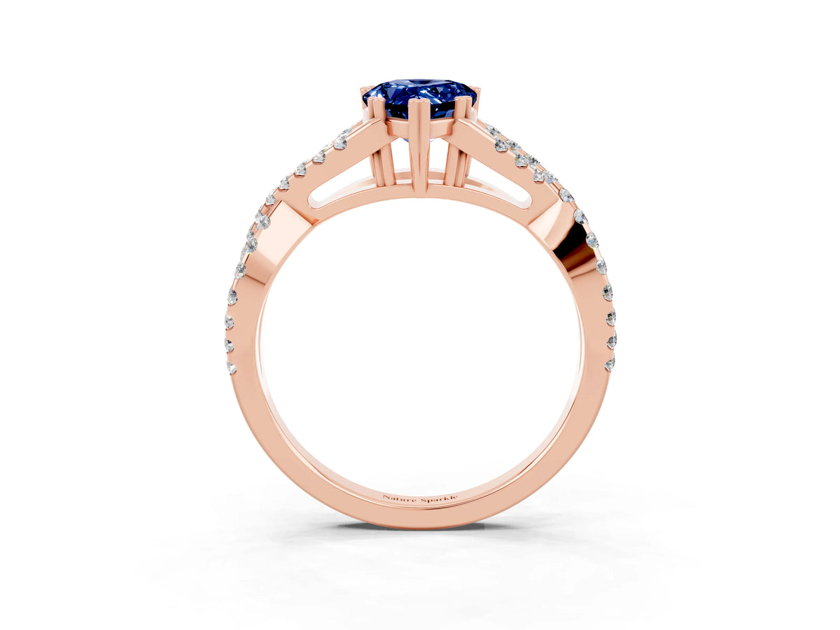 Pear Cut Blue Sapphire Solitaire Ring in Rose gold with Interwoven Pavé Band and Prong Setting_3