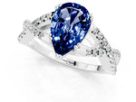 Pear Cut Blue Sapphire Solitaire Ring in White gold with Interwoven Pavé Band and Prong Setting_1