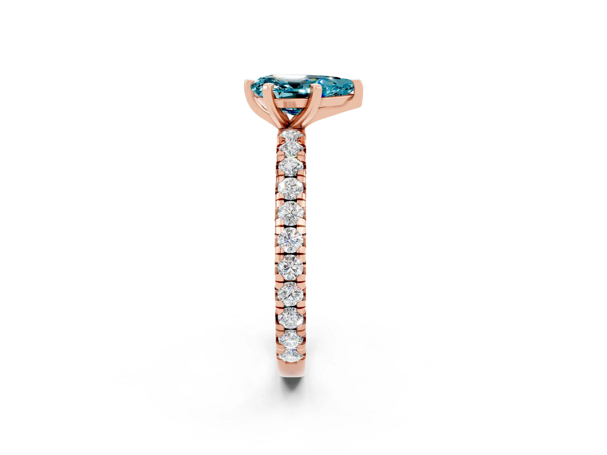 Pear Cut Blue Topaz Pavé Solitaire Ring in Rose gold with Round Pavé Band and Prong Setting_2