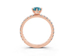 Pear Cut Blue Topaz Pavé Solitaire Ring in Rose gold with Round Pavé Band and Prong Setting_3