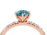 Pear Cut Blue Topaz Pavé Solitaire Ring in Rose gold with Round Pavé Band and Prong Setting_4