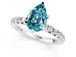Pear Cut Blue Topaz Pavé Solitaire Ring in White gold with Round Pavé Band and Prong Setting_1