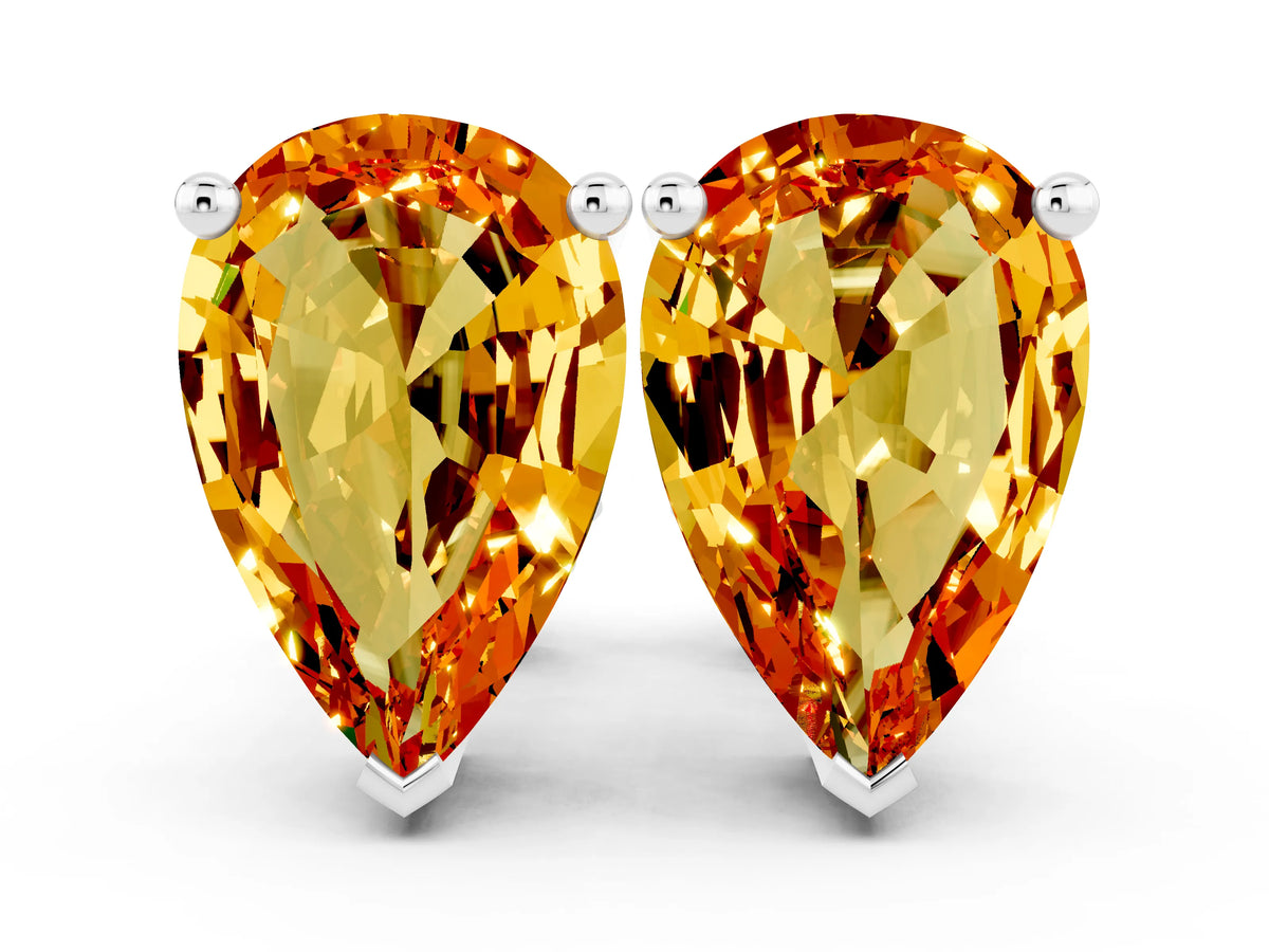 Pear Cut Citrine Stud Earrings in White gold with Basket Setting
