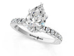 Pear Cut Diamond Hidden Halo Solitaire Ring in White gold with Round Pavé Band and Prong Setting_25