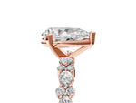 Pear Cut Diamond Solitaire Ring in Rose gold with Pear and Round Cluster Band_17