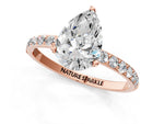 Pear Cut Diamond Solitaire Ring in Rose gold with Round Shared Prong Pavé Band_19