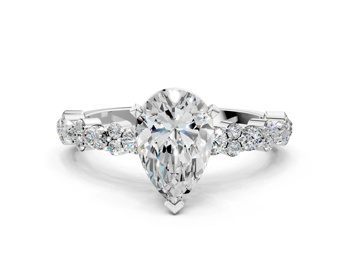 Pear Cut Diamond Solitaire Ring in White gold with Pear and Round Cluster Band_12