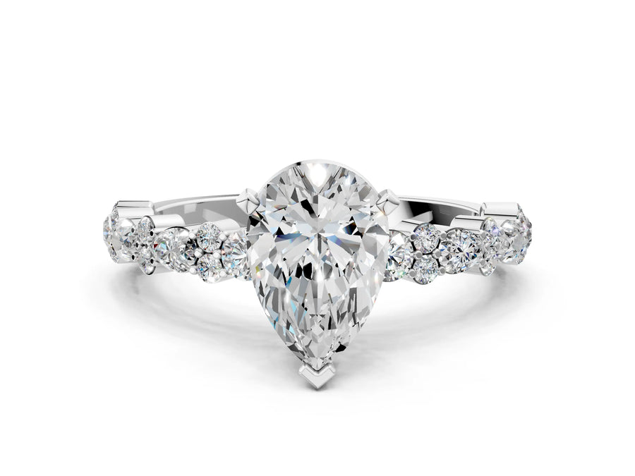 Pear Cut Diamond Solitaire Ring in White gold with Pear and Round Cluster Band