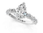 Pear Cut Diamond Solitaire Ring in White gold with Pear and Round Cluster Band_13