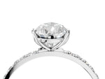 Pear Cut Diamond Solitaire Ring in White gold with Round Shared Prong Pavé Band_22