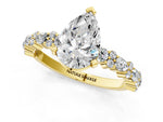 Pear Cut Diamond Solitaire Ring in Yellow gold with Pear and Round Cluster Band_13