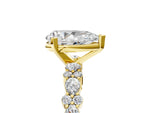 Pear Cut Diamond Solitaire Ring in Yellow gold with Pear and Round Cluster Band_17