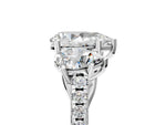 Pear Cut Diamond Trellis Three-Stone Engagement Ring in White gold with Round Side Stones_23