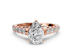 Pear Cut Diamond Vintage Scroll Solitaire Ring in Rose gold with Graduated Round Side Stones_12
