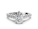 Pear Cut Diamond Vintage Scroll Solitaire Ring in White gold with Graduated Round Side Stones_18