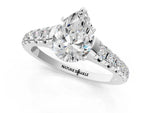 Pear Cut Diamond Vintage Scroll Solitaire Ring in White gold with Graduated Round Side Stones_19