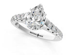 Pear Cut Diamond Vintage Scroll Solitaire Ring in White gold with Graduated Round Side Stones_7