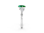 Pear Cut Emerald Solitaire Ring in Platinum with Crossover Gallery and Round Pavé Band_2